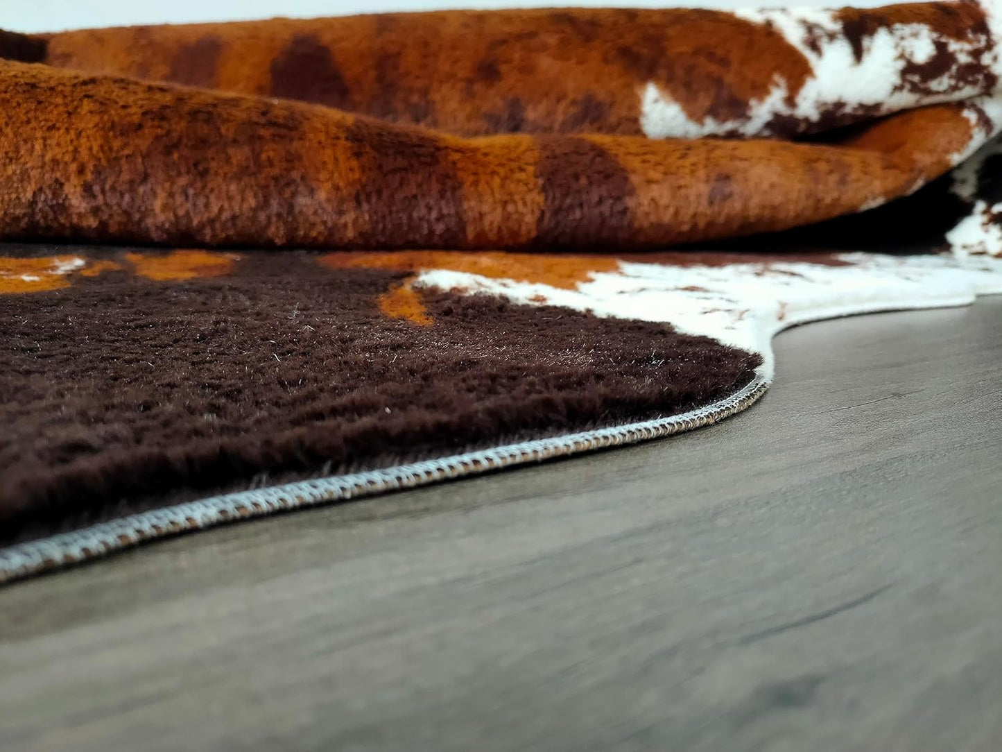 JACCAWS Faux Cowhide Rug Large (6.2ft x 8.2ft),Natural Pattern Tricolor Cow Print Rug,Bedroom Living Room Animal Hide Rugs Carpet with Non-Slip Backing. (Brown-Black-White, 6.2ft x 8.2ft)